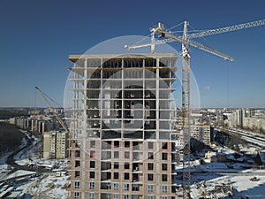 Lviv, Sychiv, Ukraine - 2 7 2020: Tower cranes work during the construction of a multi-story building. New apartments