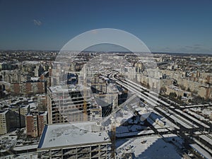 Lviv, Sychiv, Ukraine - 2 7 2020: Tower cranes work during the construction of a multi-story building. New apartments