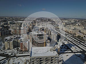 Lviv, Sychiv, Ukraine - 2 7 2020: Tower cranes work during the construction of a multi-story building. New apartments