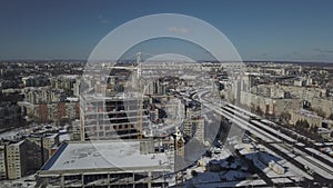 Lviv, Sychiv, Ukraine - 2 7 2020: Tower cranes work during the construction of a multi-story building. New apartments for resident