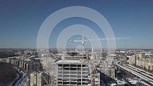 Lviv, Sychiv, Ukraine - 2 7 2020: Tower cranes work during the construction of a multi-story building. New apartments for resident