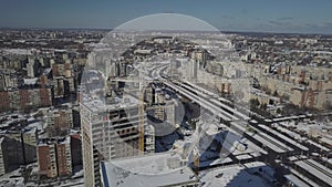 Lviv, Sychiv, Ukraine - 2 7 2020: Tower cranes work during the construction of a multistory building. New apartments for resident