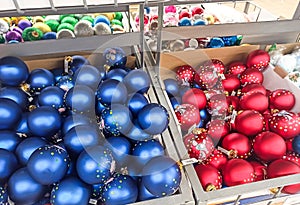 LVIV, UKRAINE - December 10, 2019 :.Holiday Christmas and New Year toys, garlands at the shelves of store