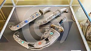 LVIV, UKRAINE - DECEMBER 7, 2019: Ritual daggers of the Qing Dynasty. The medieval history of China.