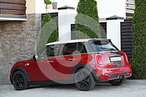Lviv, Ukraine - May 10, 2022: Red Mini Cooper S parked outdoors