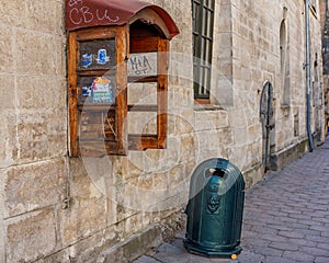 LVIV, UKRAINE - SEPTEMBER 08, 2016: Lviv City and Recicle Bin, Phone Box.