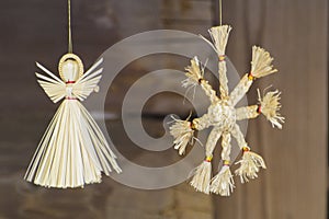 LVOV, UKRAINE- JANUARY 20, 2018: Straw Christmas angel and sun.