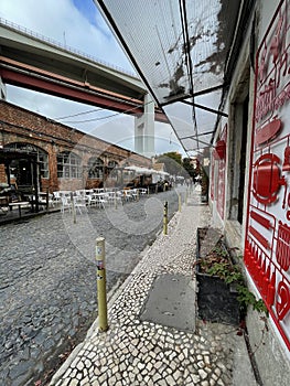 LX Factory shops and main empty street in Lisboa, Lisbon, Portugal