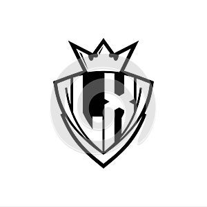 LX Letter logo with sharp triangle shield shape with crown inside white outline on white background template design