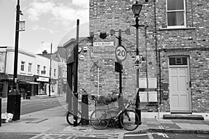 Lyal Road corner, brick building and street sign.