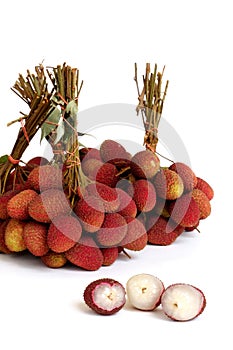 Lychee, bunch of fresh lychees isolated on white