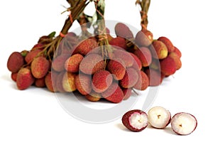 Lychee. bunch of fresh lychees isolated on white