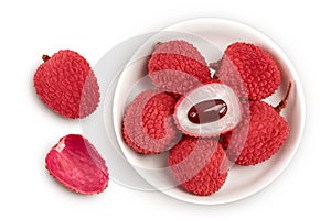 lychee fruit in ceramic bowl isolated on white background with full depth of field. Top view. Flat lay
