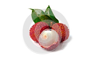 Lychee with leaves isolated on white background. Tropical fruit