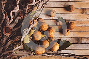 lychee - Litchi chinensis closeup on brown board