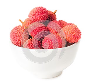 Lychees fruits in bowl isolated