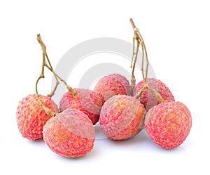 Lychees on white background
