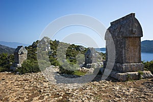 Lycian rock tombs, Glorious rock sarcophagus at ancient Lycian necropolis on hill in Simena, Turkey