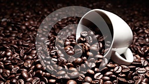 Lying coffee cup with coffee beans