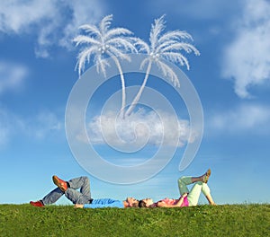 Lying couple on grass and dream island collage