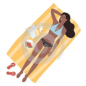 Lying girl on summer beach holiday taking sunbath
