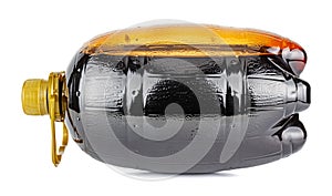 Lying large transparent brown plastic barrel shaped bottle with drink isolated on white background