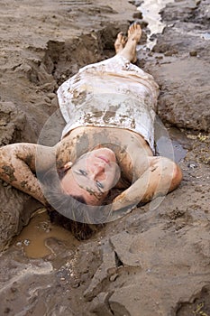 Lying in the mud