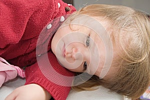 Lying playing little girl smiling happy. cute caucasian baby