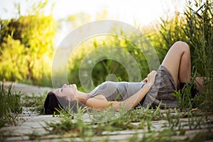 Lying on a walkway