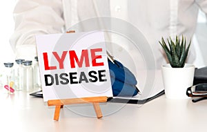 Lyme Disease - doctor holding chalkboard with text