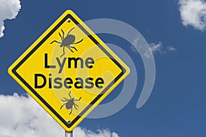 Lyme Disease warning on a on yellow highway caution road sign