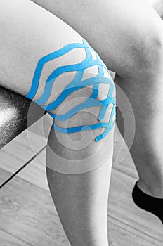 Lymphatic knee technique, two fan strips. Kinesiology Tape in si