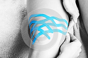 Lymphatic knee technique, two fan strips. Kinesiology Tape in si