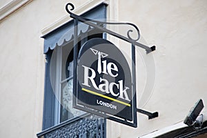 Tie rack london boutique logo brand and text sign facade chain fashion clothing