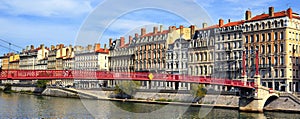 Lyon city and red footbridge