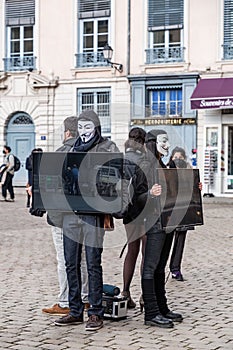 Young activists protesting animal killings in front of the Saint Jean Cathedral, Lyon, France