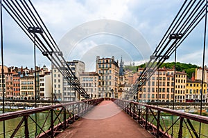 Saint Vincent footbridge over the Saone, in Lyon, in the Rhone, in France photo