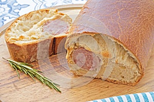 Lyonnais brioche sausage on a cutting board