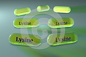 Lysine capsules. Lysine is an essential amino acid used in the biosynthesis of proteins. Lysine is required for growth photo
