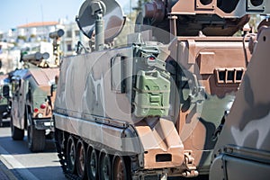 M113 armored personnel carrier, APC. Military parade. War weapon, camouflage vehicle, close up photo
