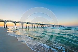 The M.B. Miller County Pier and Gulf of Mexico at sunrise, in Panama City Beach, Florida