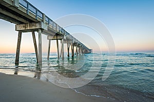 The M.B. Miller County Pier and Gulf of Mexico at sunrise, in Panama City Beach, Florida