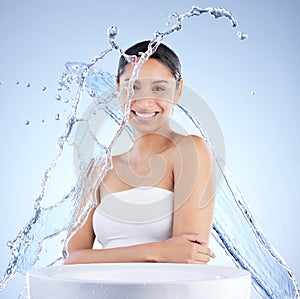 m a better person when Im moisturized. a young woman washing herself against a blue background.