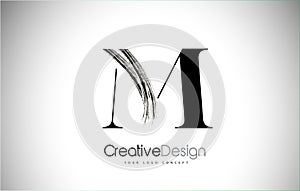 M Brush Stroke Letter Logo Design. Black Paint Logo Leters Icon.