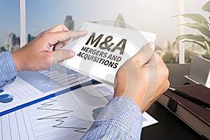 M&A (MERGERS AND ACQUISITIONS) photo