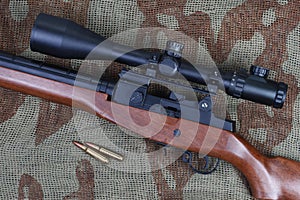 M14 sniper rifle with cartridges photo