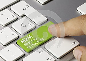 M2M machine-to-machine - Inscription on Green Keyboard Key