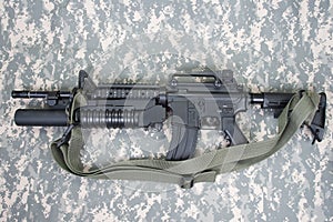 M4A1 carbine equipped with an M203 grenade launcher