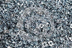 M6 metal screws galvanized white in bulk closeup