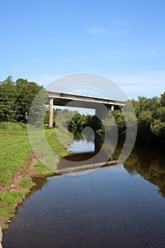 M6 motorway bridge and reflection River Lune Tebay